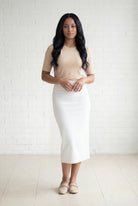 Model wearing Nuggles® 31" Relaxed Skirt in White