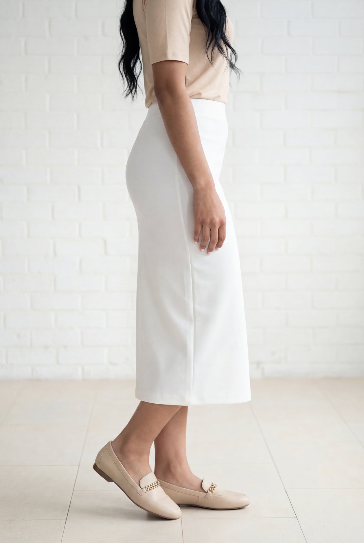 Model wearing Nuggles® 31" Relaxed Skirt in White