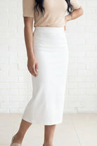 Model wearing Nuggles® 31" Relaxed Skirt in White