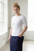 Model wearing the Nuggles® Essential Half Sleeve Tee in White