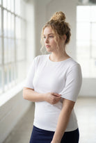 Model wearing the Nuggles® Essential Half Sleeve Tee in White