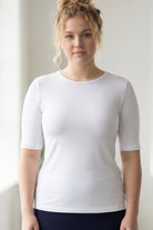 Model wearing the Nuggles® Essential Half Sleeve Tee in White