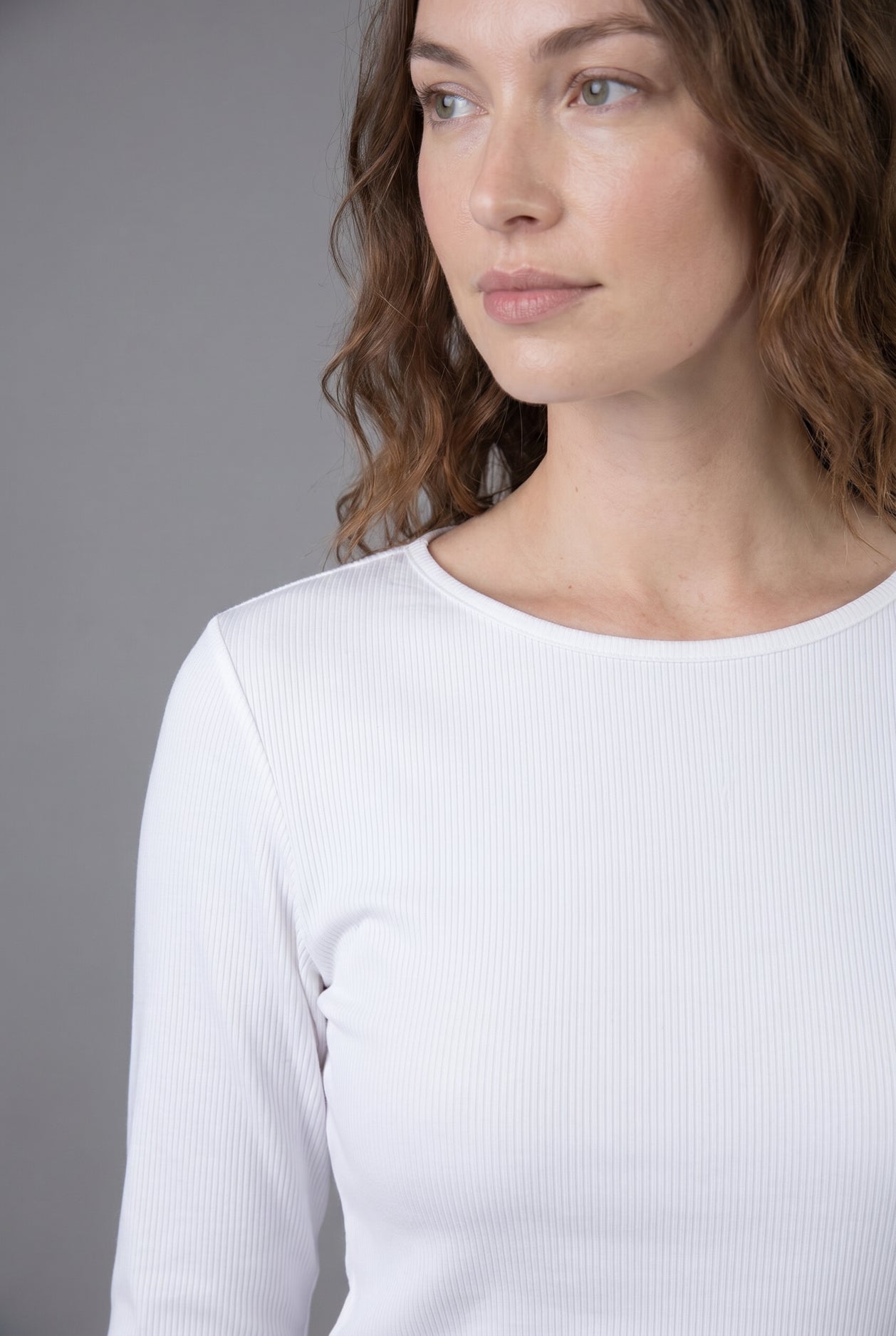 Model wearing Nuggles® 3/4 Essential Ribbed Tee in White