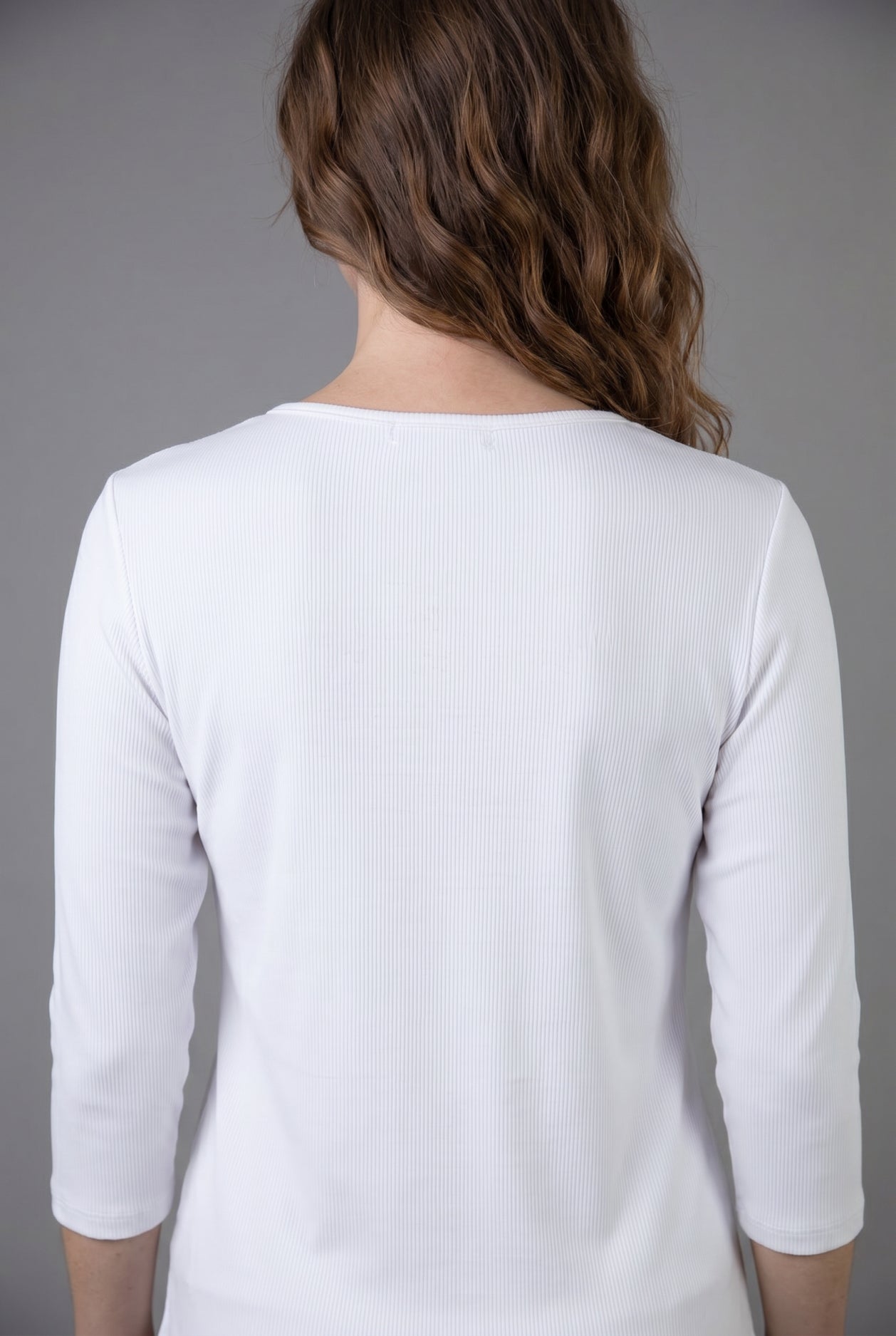 Model wearing Nuggles® 3/4 Essential Ribbed Tee in White