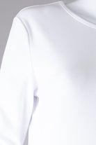 Model wearing Nuggles® Ribbed Layering Dress in White