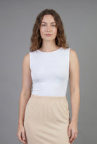 Model wearing Nuggles® Essential Tank in White