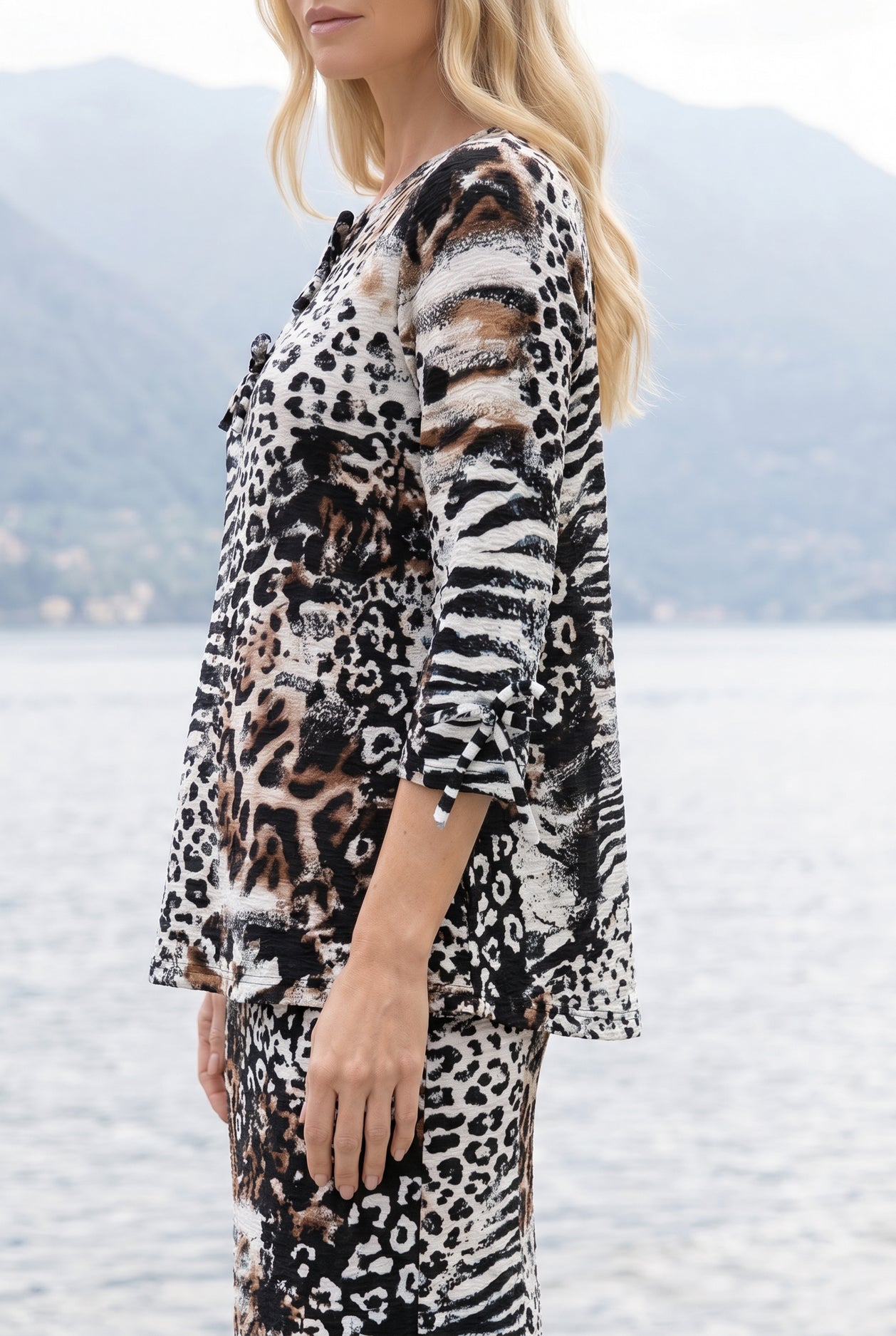 Model wearing Nuggles® Lexi Bow Top in Wild Mix