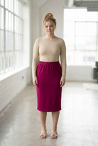 Model wearing Nuggles® 27" Classic Skirt  in Wine