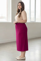 Model wearing Nuggles® 34" Classic Skirt  in Wine