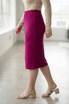 Model wearing Nuggles® 27" Classic Skirt  in Wine