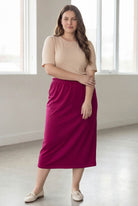 Model wearing Nuggles® 34" Classic Skirt  in Wine