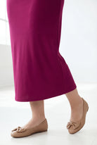 Model wearing Nuggles® 31" Classic Skirt  in Wine