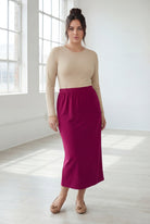 Model wearing Nuggles® 31" Classic Skirt  in Wine
