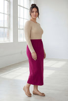 Model wearing Nuggles® 31" Classic Skirt  in Wine