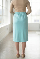 Model wearing Nuggles® 27" Classic Skirt in Aqua