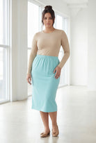 Model wearing Nuggles® 31" Classic Skirt in Aqua