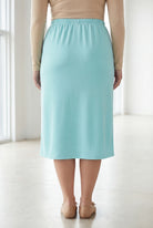 Model wearing Nuggles® 31" Classic Skirt in Aqua