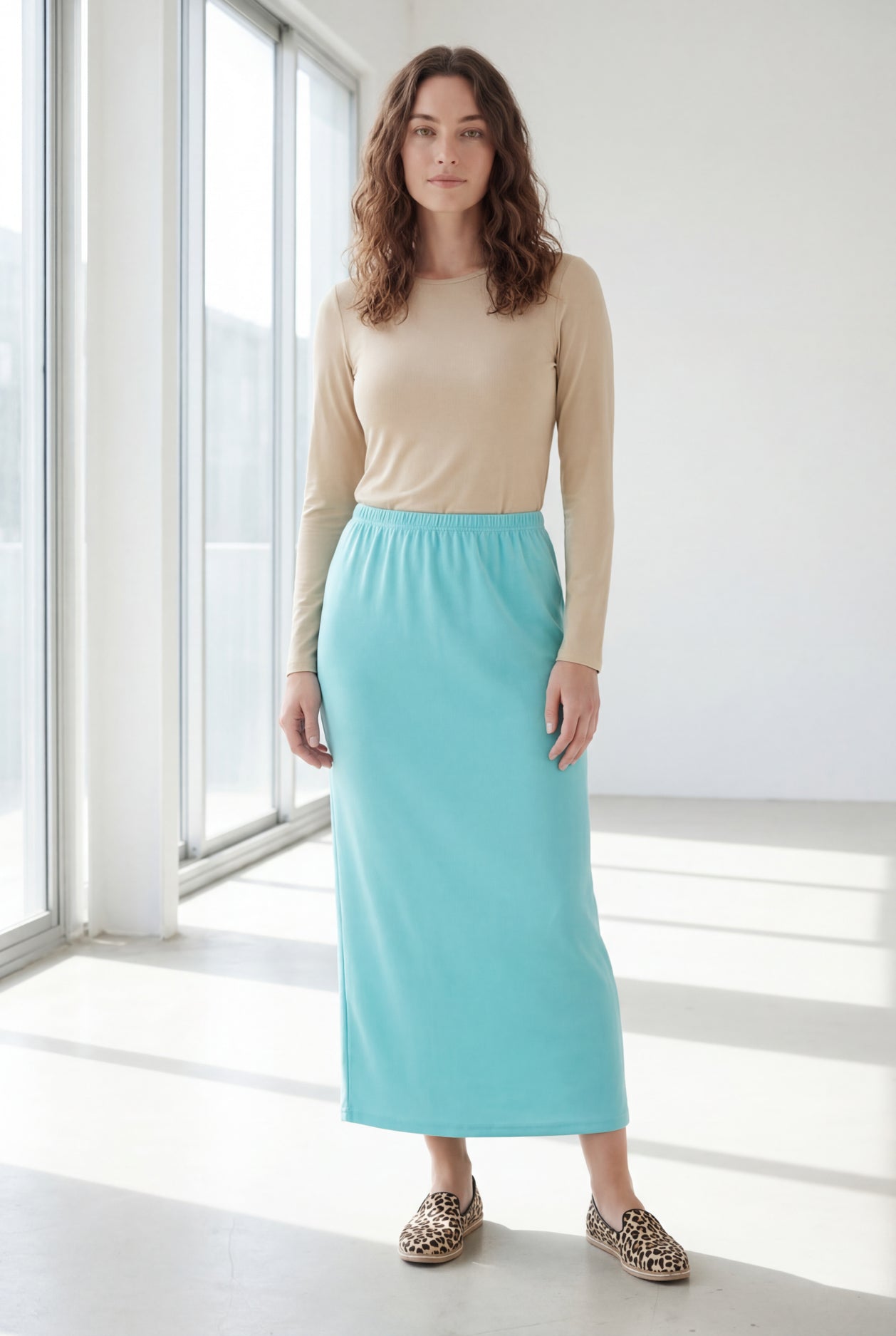 Model wearing Nuggles® 36" Classic Skirt in Aqua