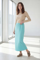Model wearing Nuggles® 36" Classic Skirt in Aqua