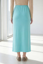 Model wearing Nuggles® 36" Classic Skirt in Aqua
