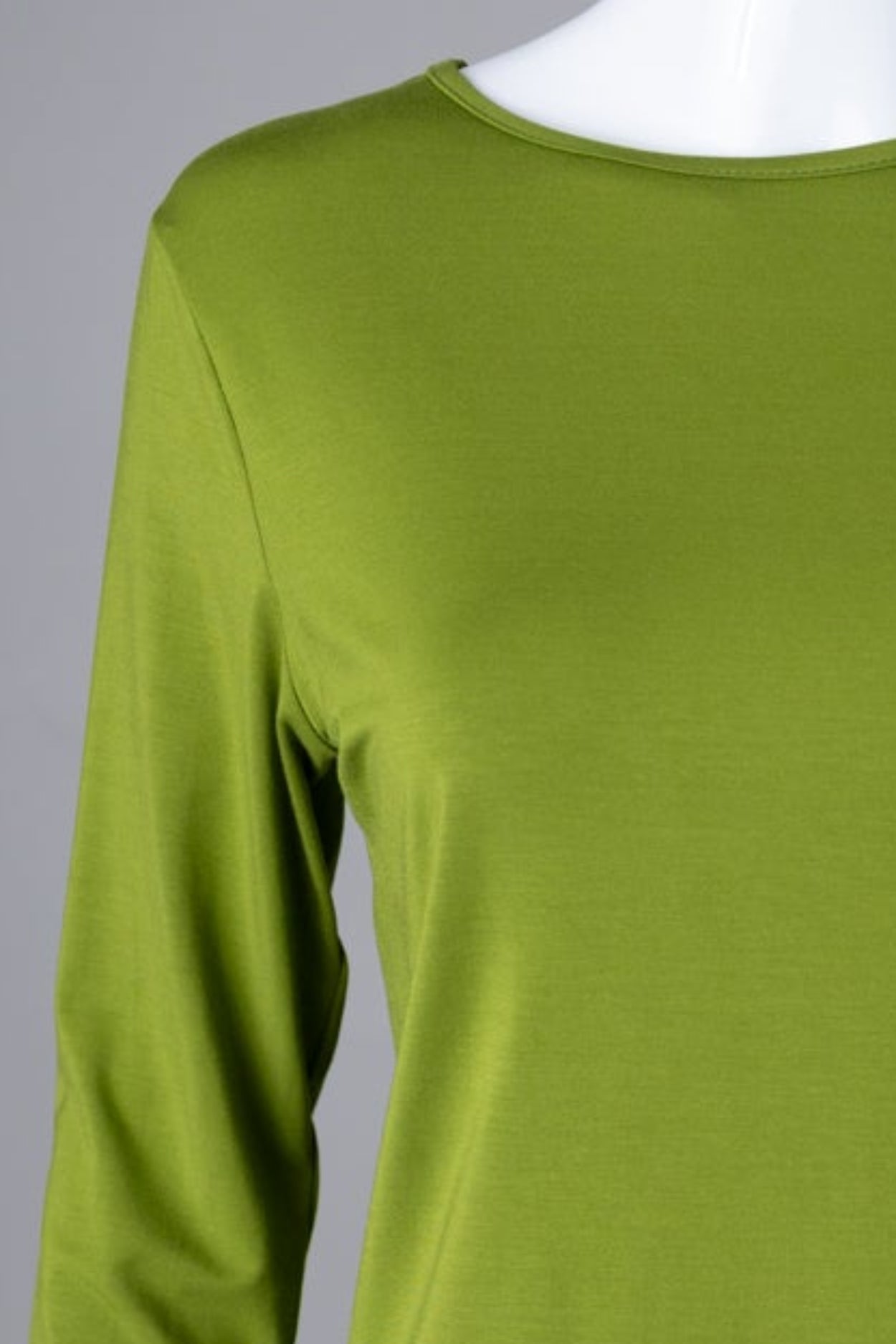 Model wearing Nuggles® 3/4 Essential Tee in Avacado