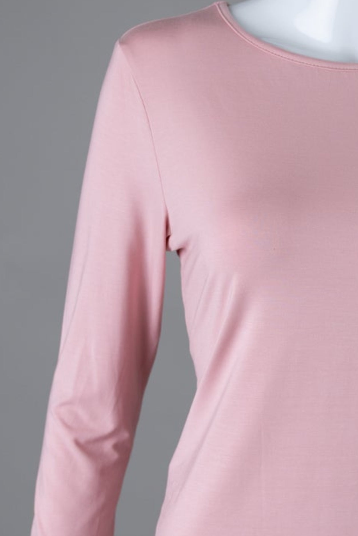 Model wearing Nuggles® 3/4 Essential Tee in Baby Pink