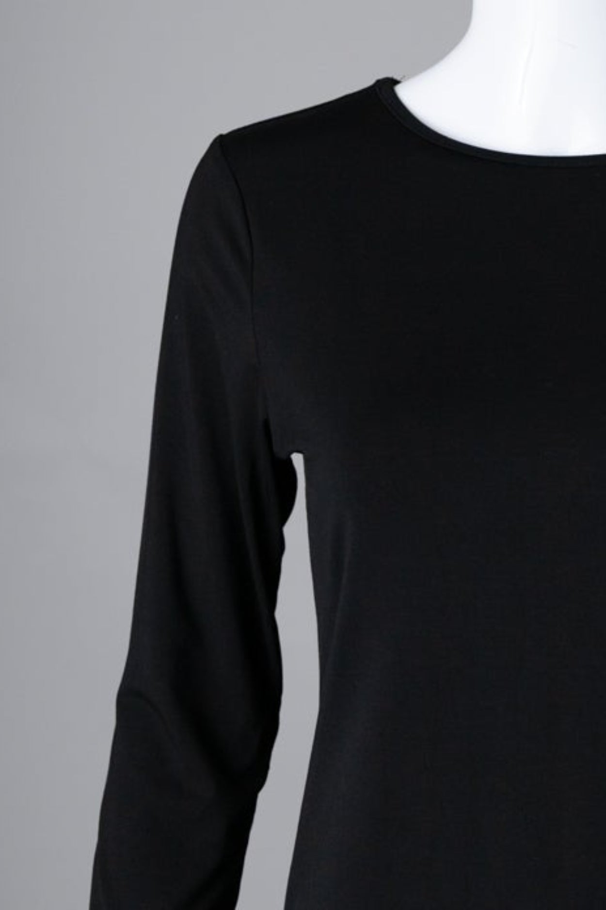 Model wearing Nuggles® 3/4 Essential Tee in Black