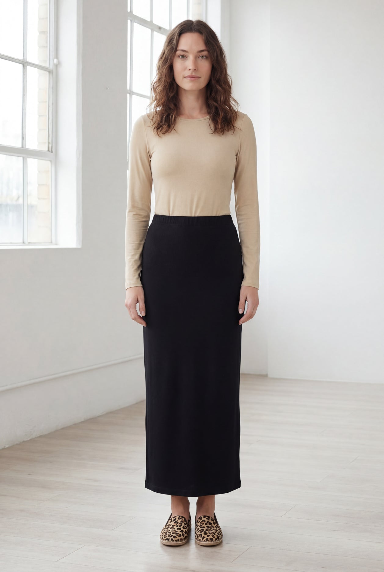 Model wearing Nuggles® 36" Classic Skirt in Black