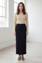 Model wearing Nuggles® 36" Classic Skirt in Black