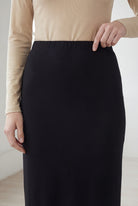 Model wearing Nuggles® 36" Classic Skirt in Black