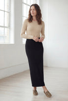 Model wearing Nuggles® 36" Classic Skirt in Black