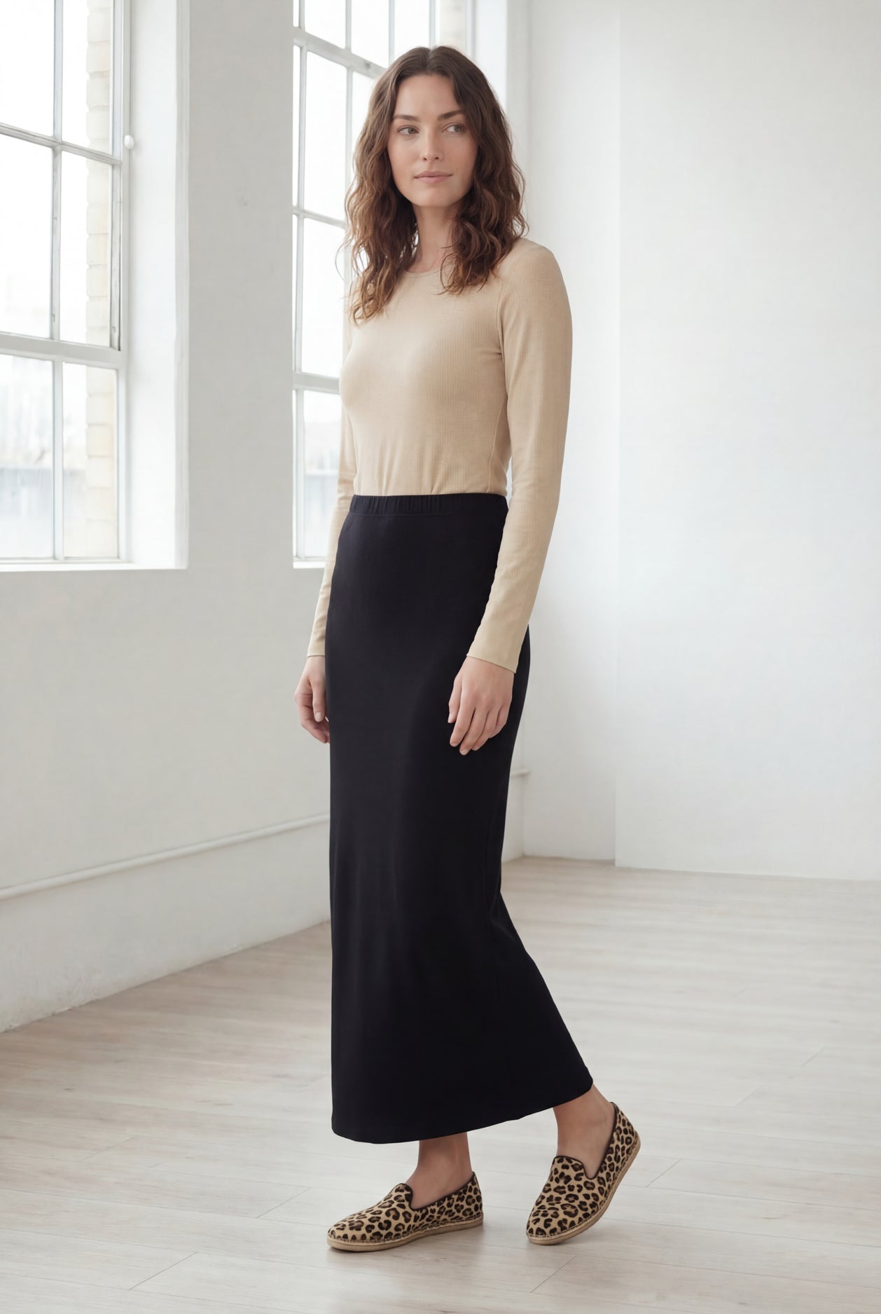 Model wearing Nuggles® 36" Classic Skirt in Black
