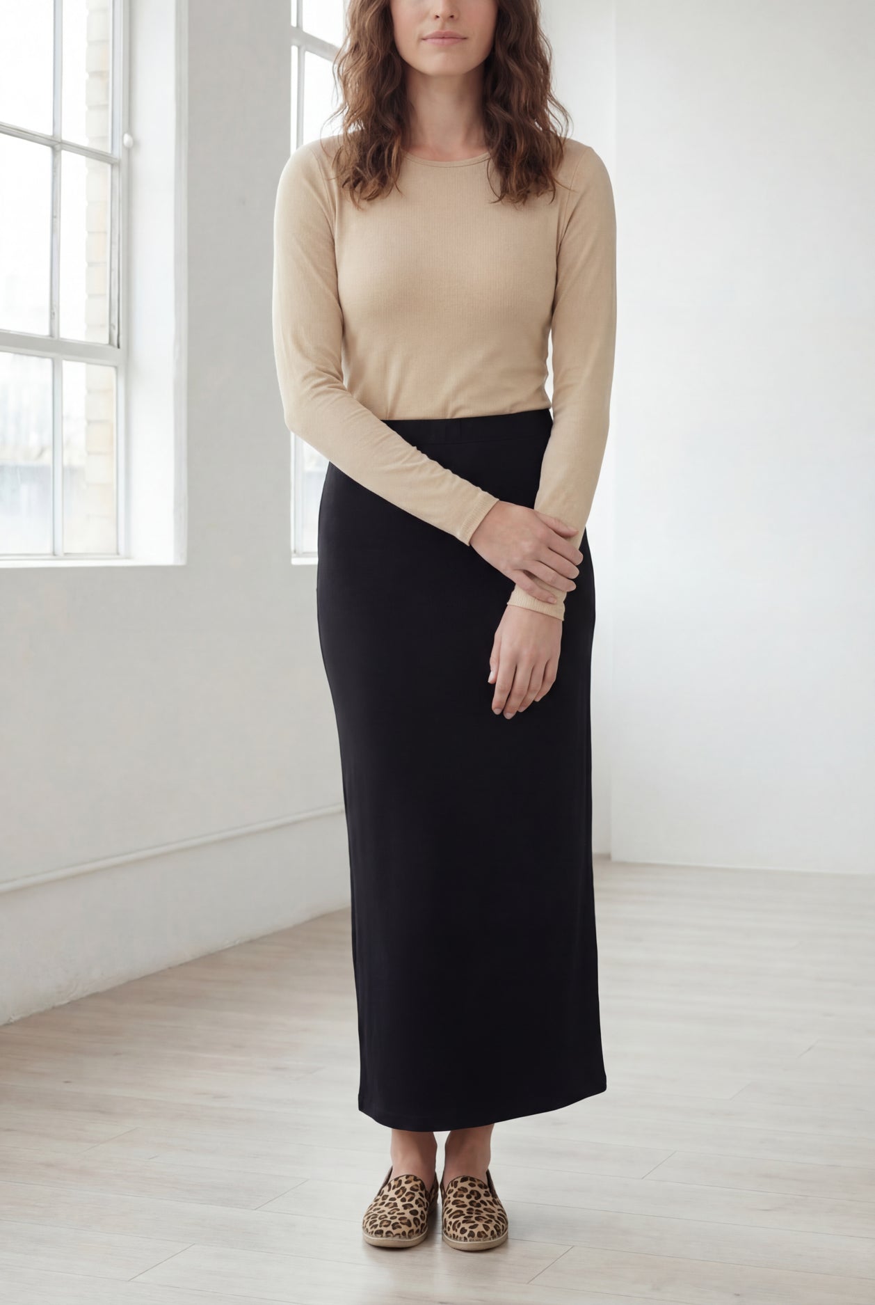 Model wearing Nuggles® 36" Classic Skirt in Black