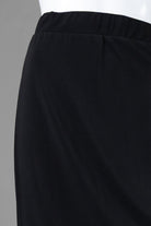 Model wearing Nuggles® 27" Lightweight Lined Pencil Skirt in Black