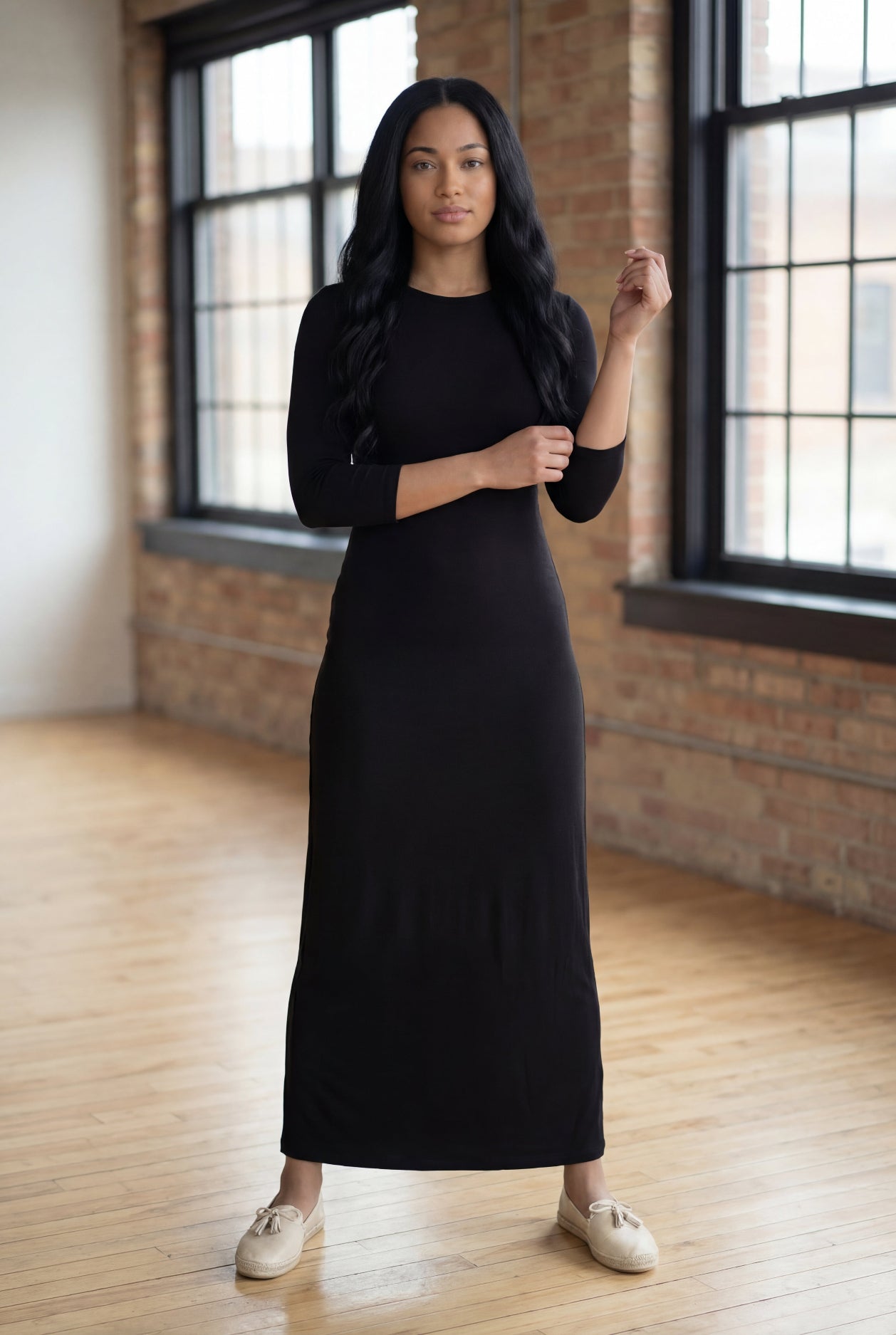 Model wearing Nuggles® Maxi Layering Dress in Black