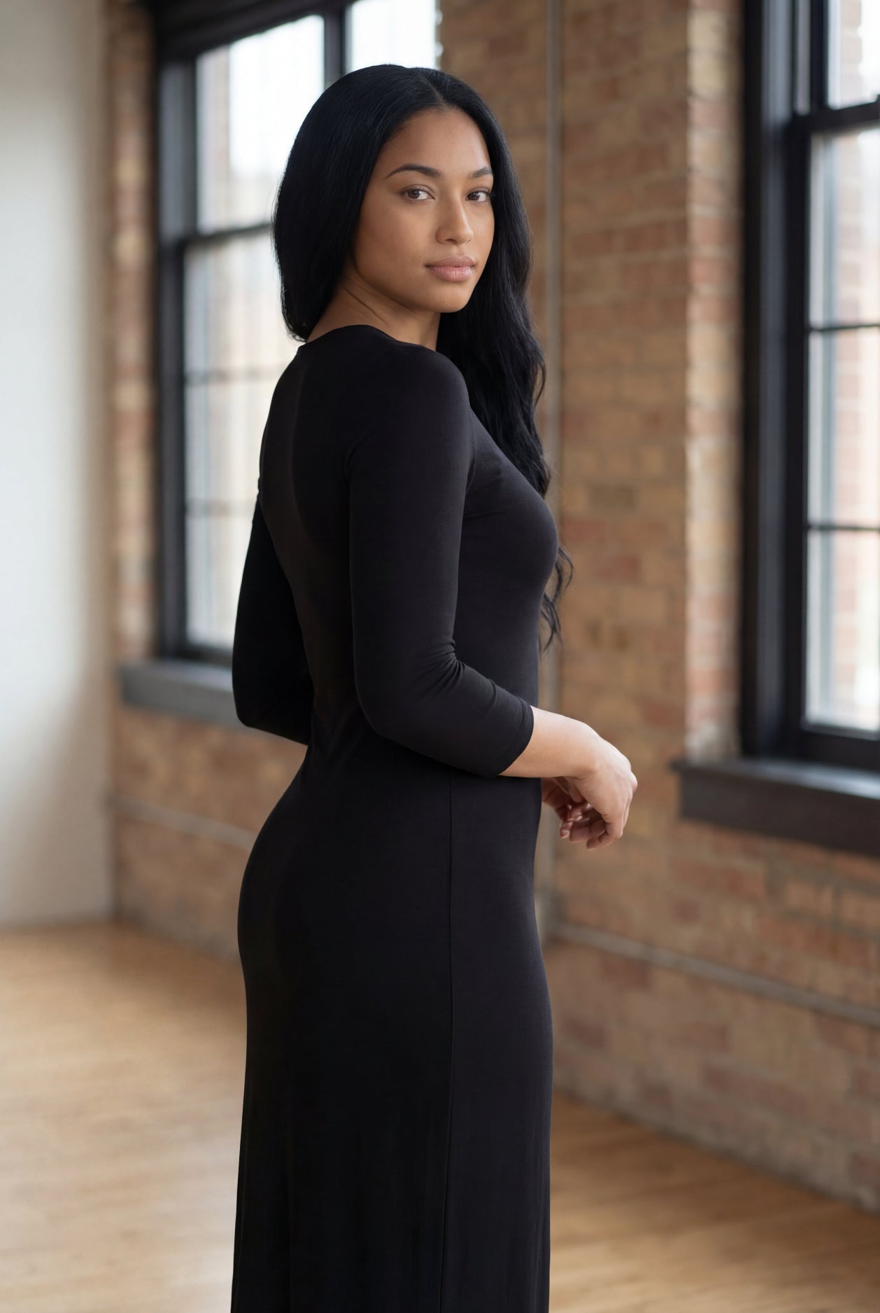 Model wearing Nuggles® Maxi Layering Dress in Black