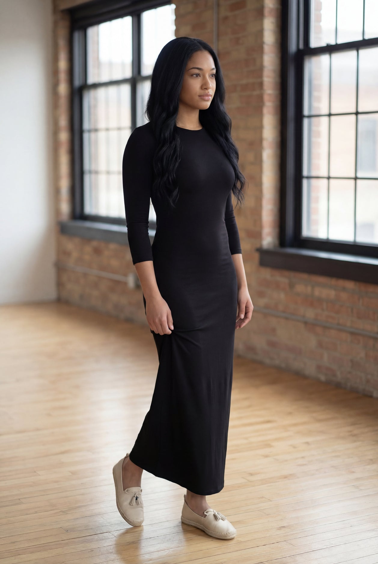 Model wearing Nuggles® Maxi Layering Dress in Black