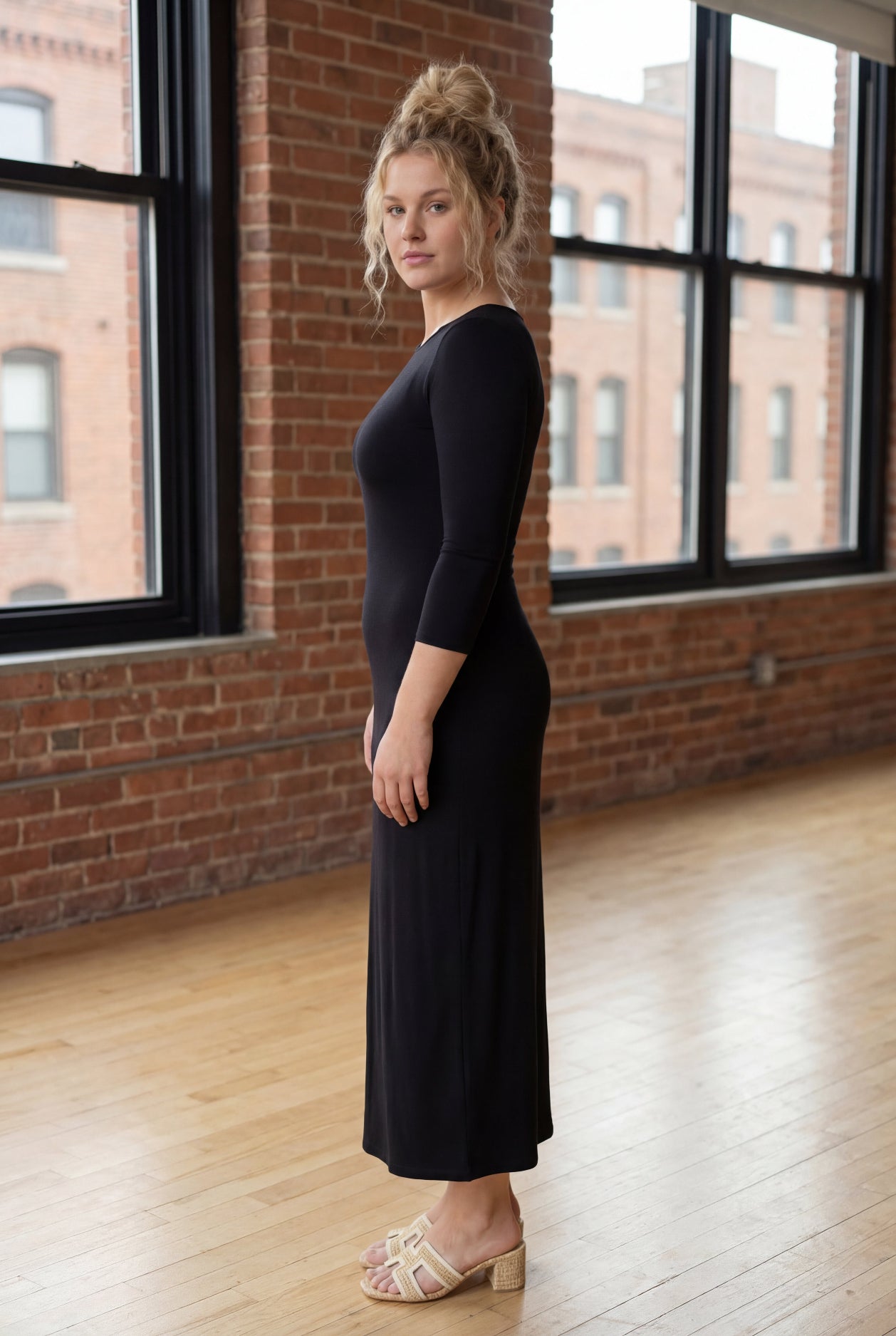 Model wearing Nuggles® Tea Layering Dress in Black