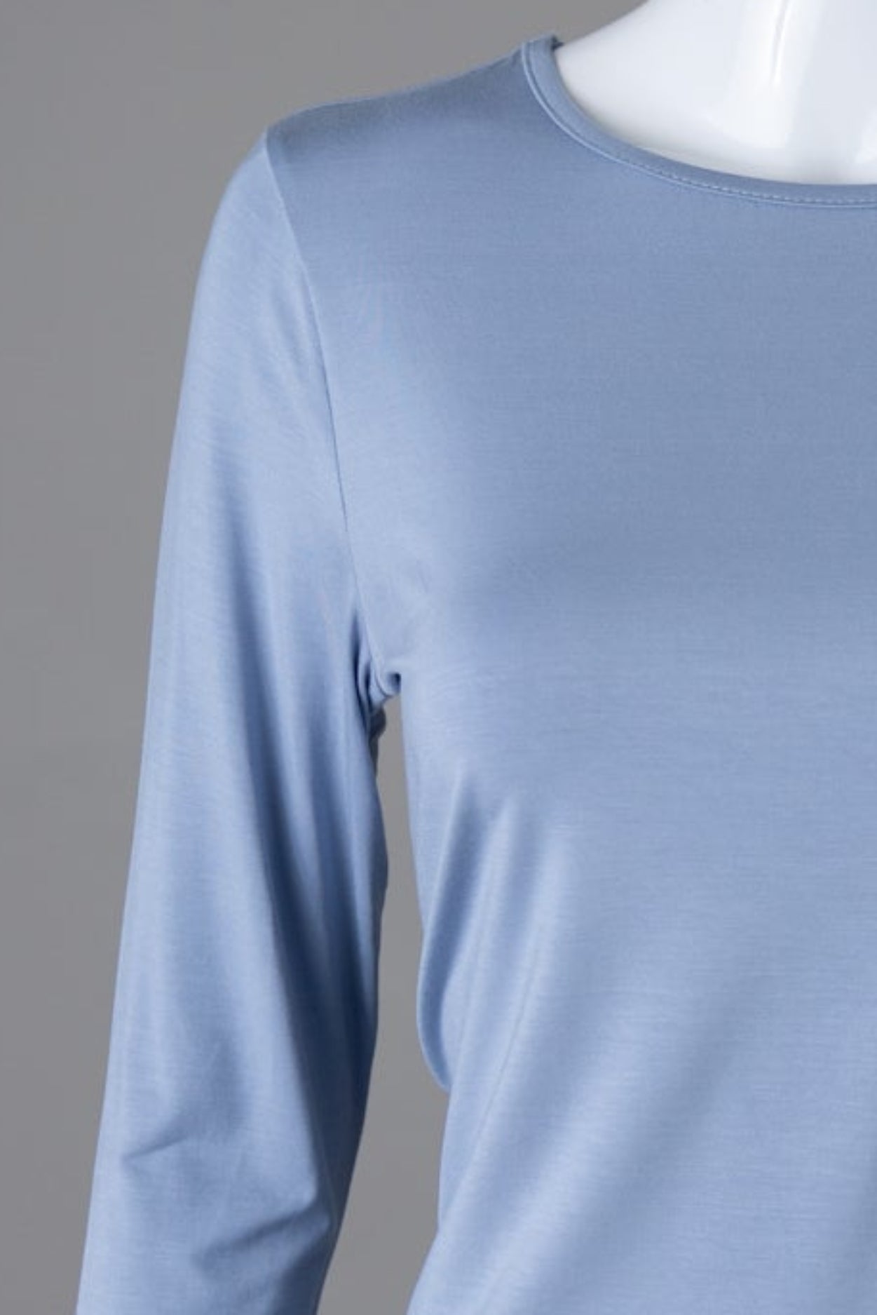 Model wearing Nuggles® 3/4 Essential Tee in Blue Pearl