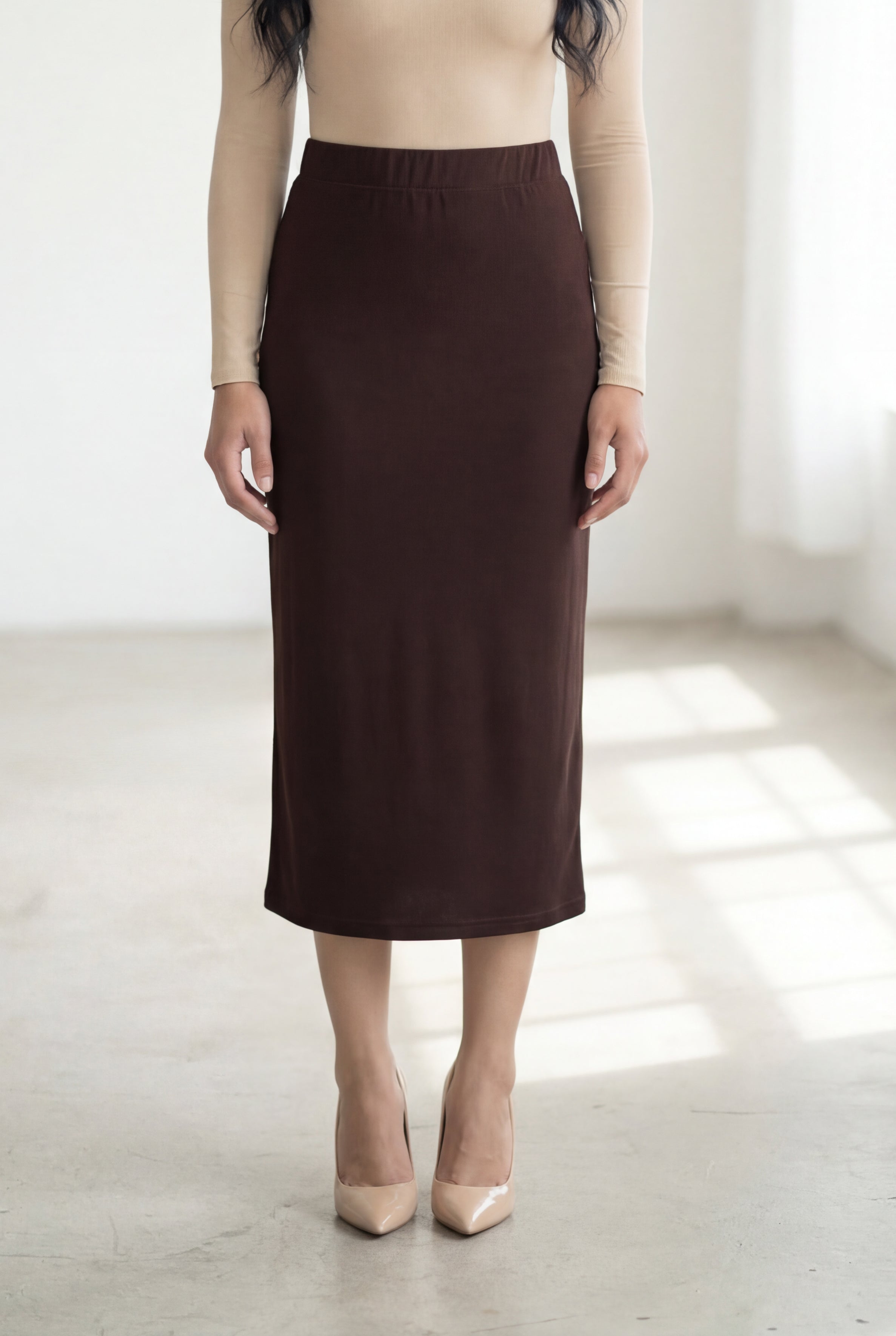 Model wearing Nuggles® 31" Lightweight Lined Pencil Skirt  in Brown