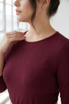 Model wearing Nuggles®  Half Sleeve Essential Tee in Burgundy