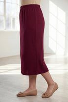 Model wearing Nuggles®  31" Classic Skirt in Burgundy

