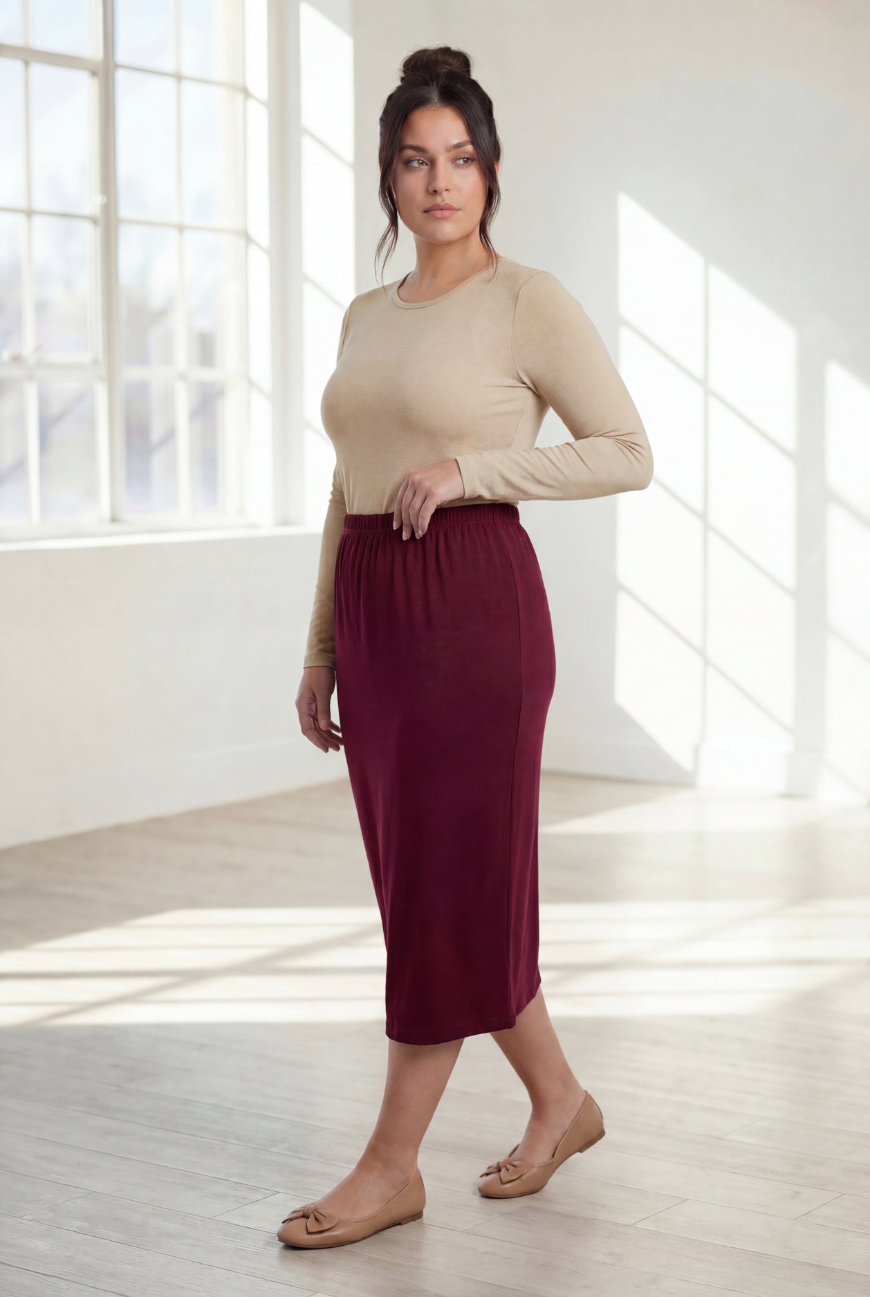 Model wearing Nuggles®  31" Classic Skirt in Burgundy
