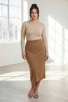 Model wearing Nuggles®  31" Classic Skirt in Camel
