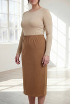 Model wearing Nuggles®  31" Classic Skirt in Camel
