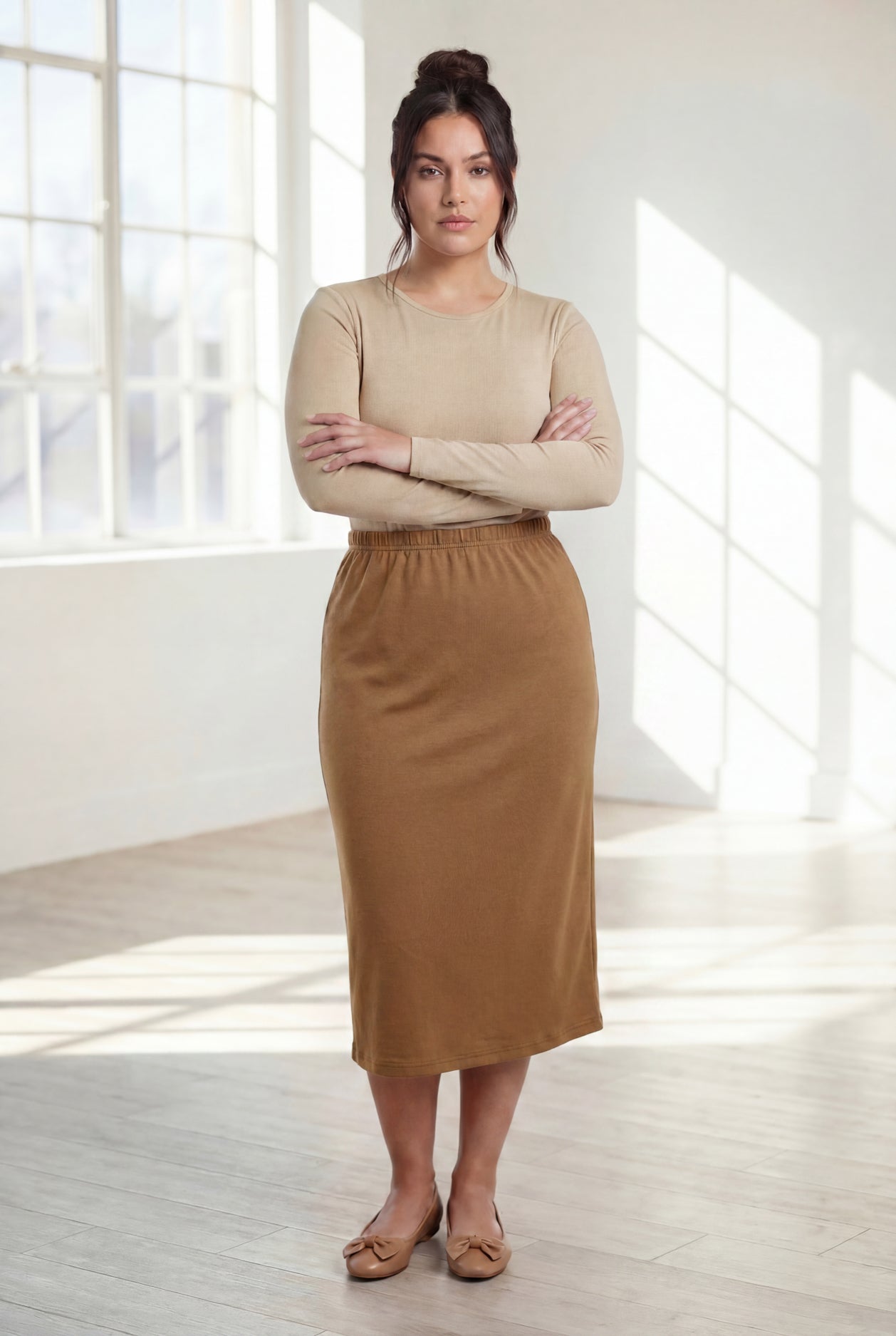 Model wearing Nuggles®  31" Classic Skirt in Camel

