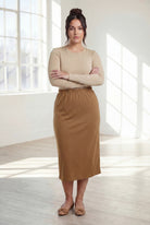 Model wearing Nuggles®  31" Classic Skirt in Camel
