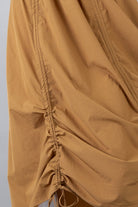 Model wearing Nuggles® Oriana Skirt in Camel