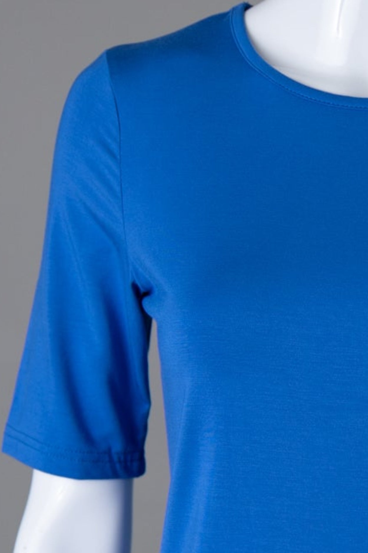 Model wearing Nuggles®  Half Sleeve Essential Tee in Lapiz Blue