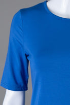 Model wearing Nuggles®  Half Sleeve Essential Tee in Lapiz Blue